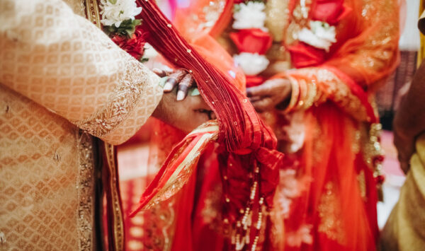 Ritual with coconut leaves during traditional Hindu wedding cere Ritual with coconut leaves during traditional Hindu wedding ceremony